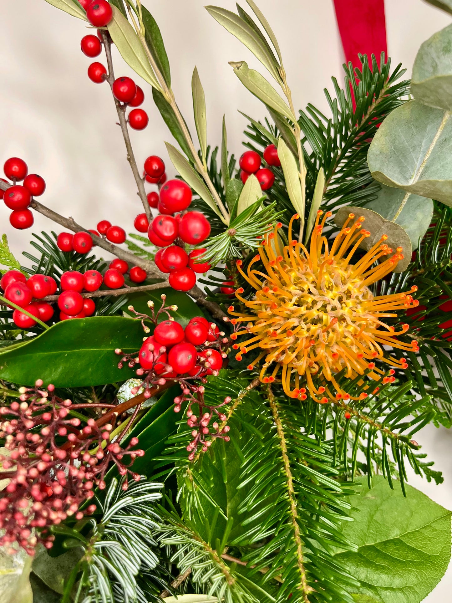 Corona de Navidad en Tonos Rojos