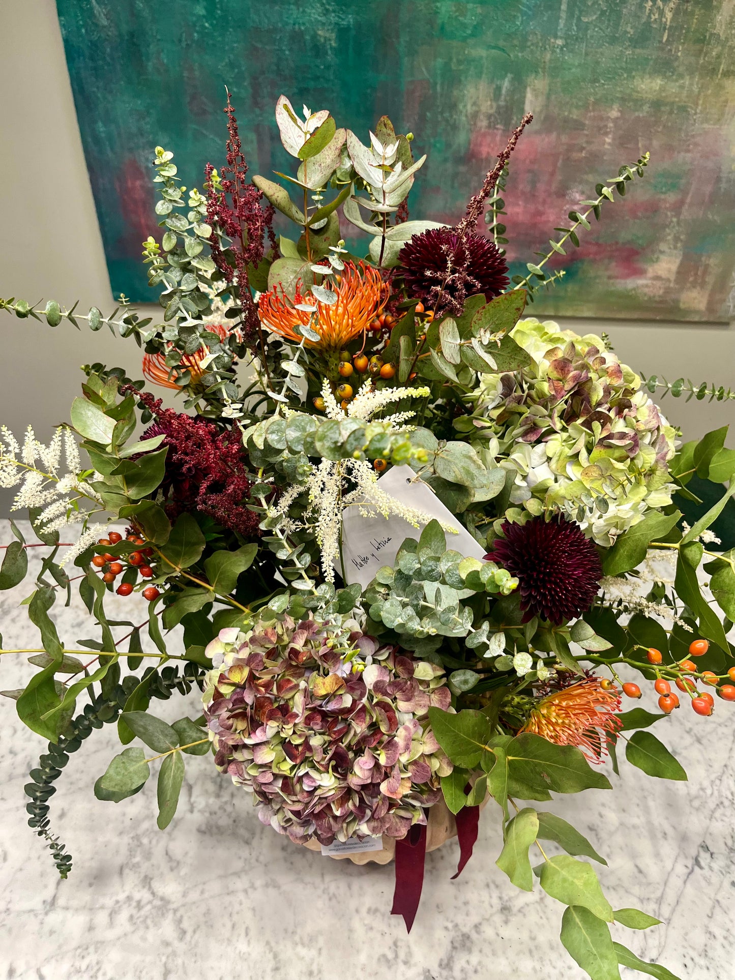 Arreglo Floral estilo Garoa en tonos Burdeos