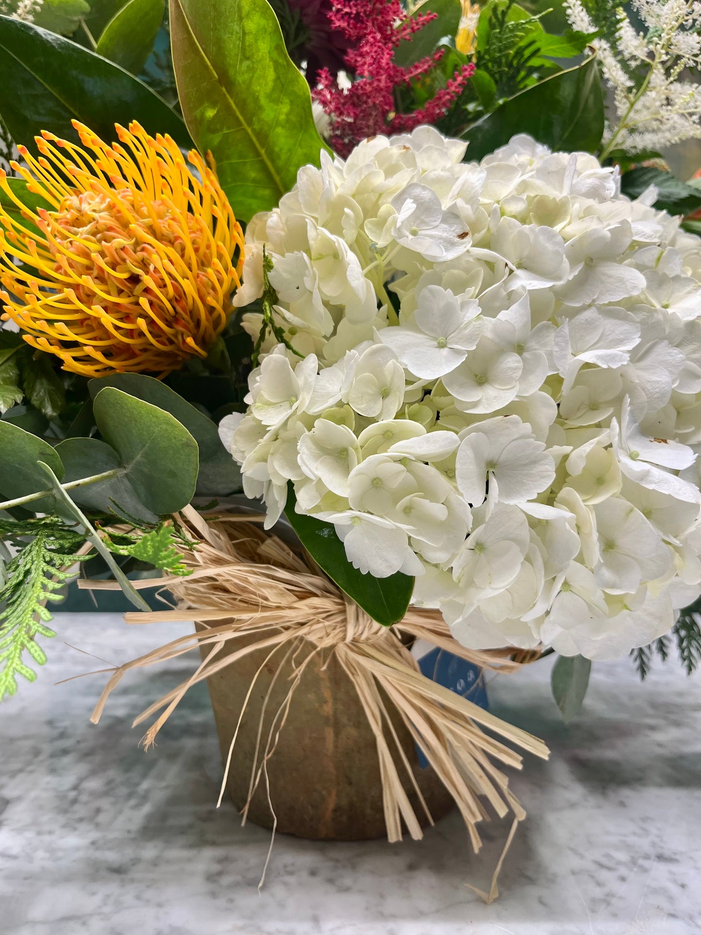 Arreglo Floral en Base de Barro Pequeño