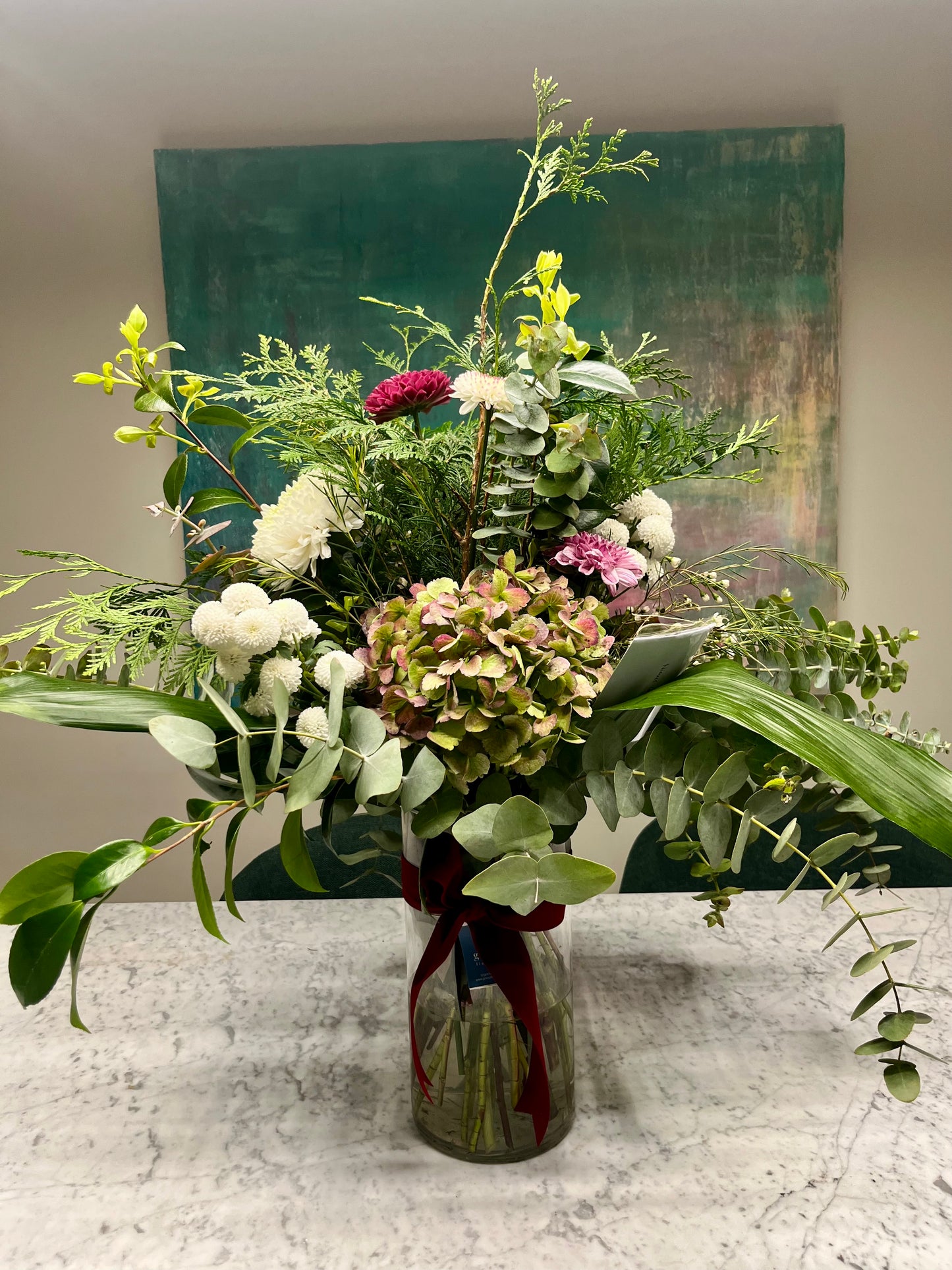 Arreglo Floral en tonos Verdes y Rosas